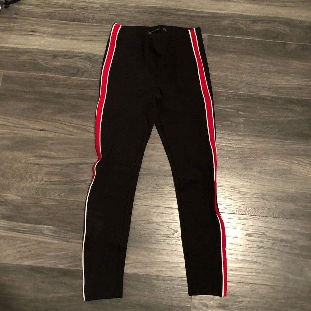 Black leggings with red stripe